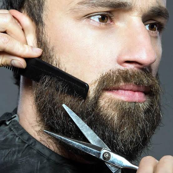 trimming the shave using comb and scissors